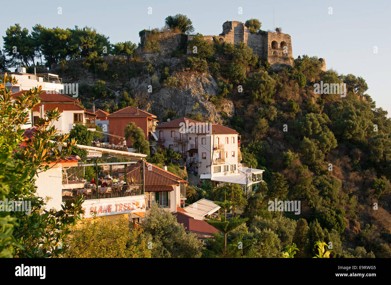 EPIRUS, GREECE. An evening view of the town of Parga and its hilltop Venetian castle. 2014. Stock Photo