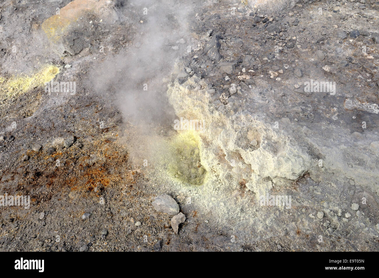 Sulphurous  smoke from a small crater hole Vulcano Island Sicily Italy Stock Photo