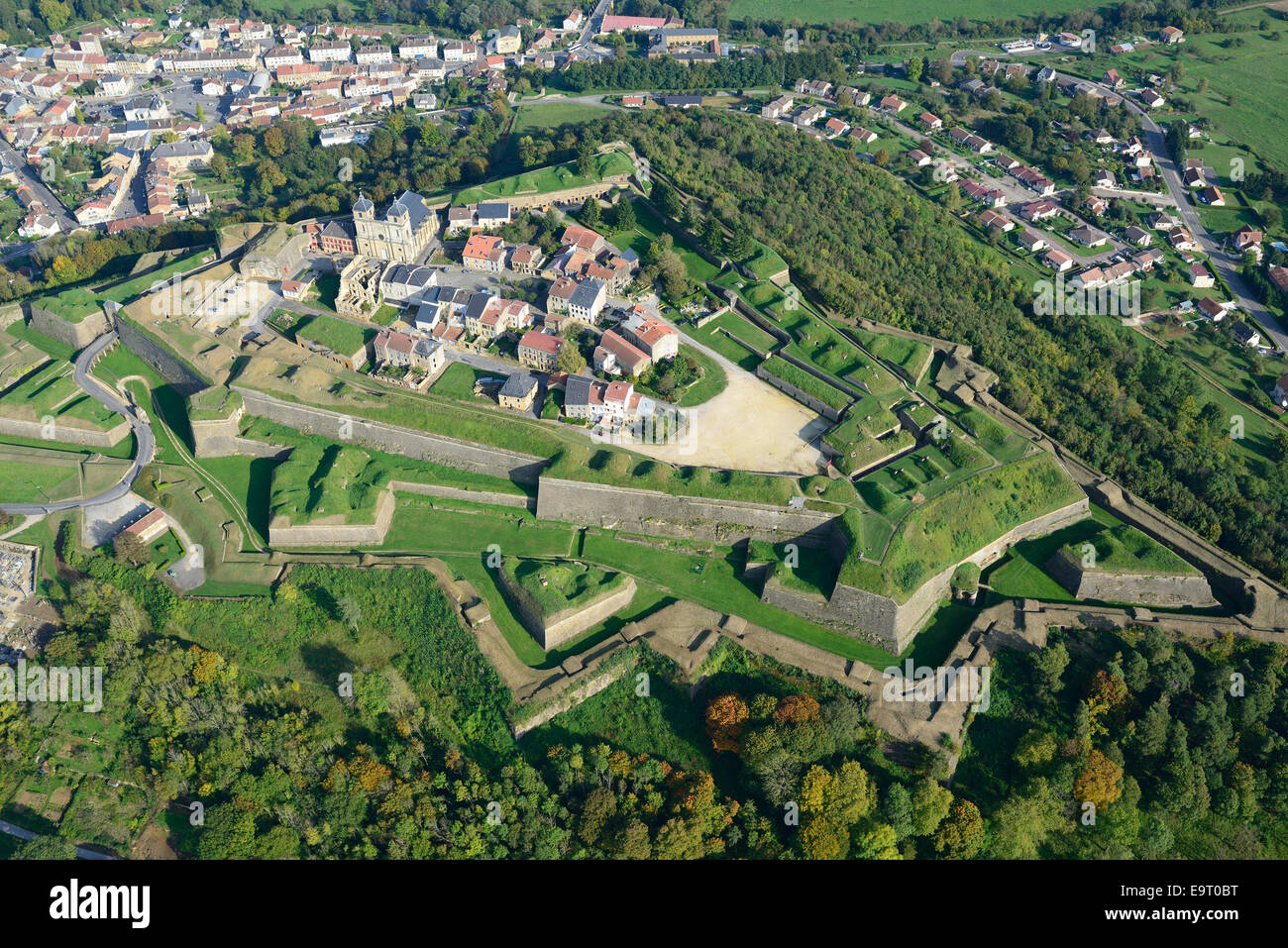 AERIAL VIEW. Medieval citadel on a hilltop overlooking the newer town. Montmedy, Meuse, Lorraine, Grand Est, France. Stock Photo