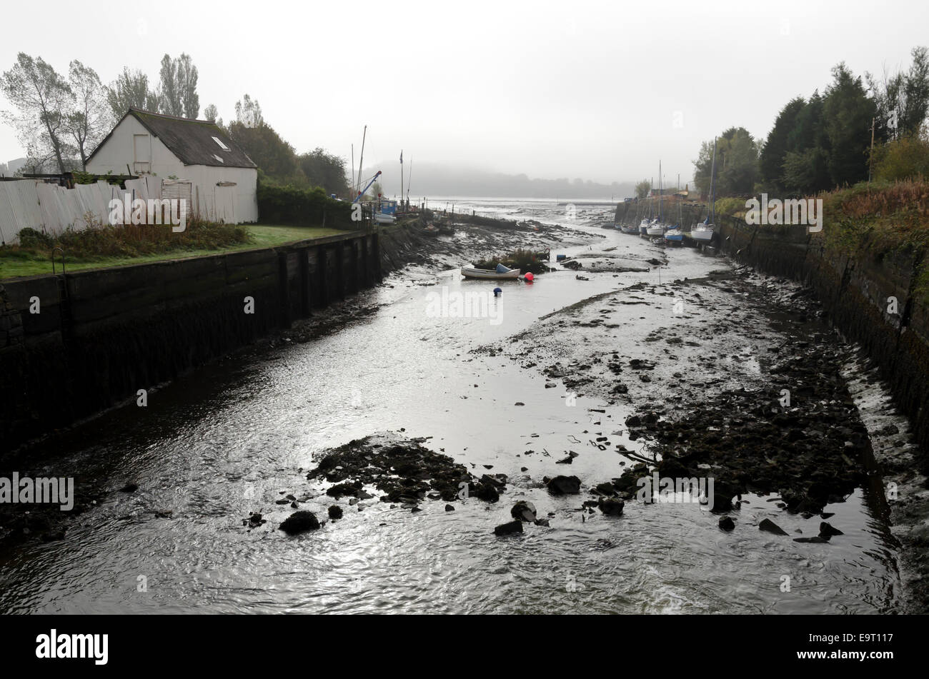 The old harbour in Inverkeithing, Fife, Scotland with a misty Firth of Forth beyond. Stock Photo