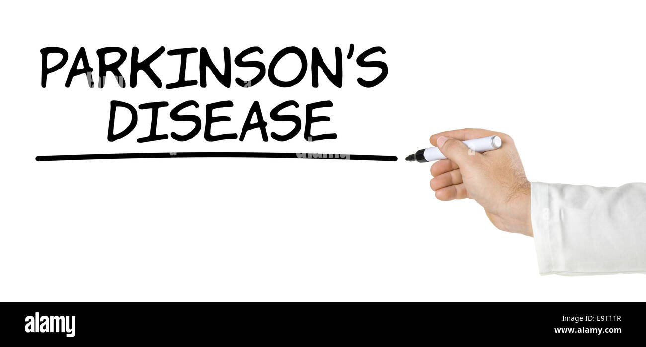 Hand with pen writing Parkinsons Disease Stock Photo Alamy