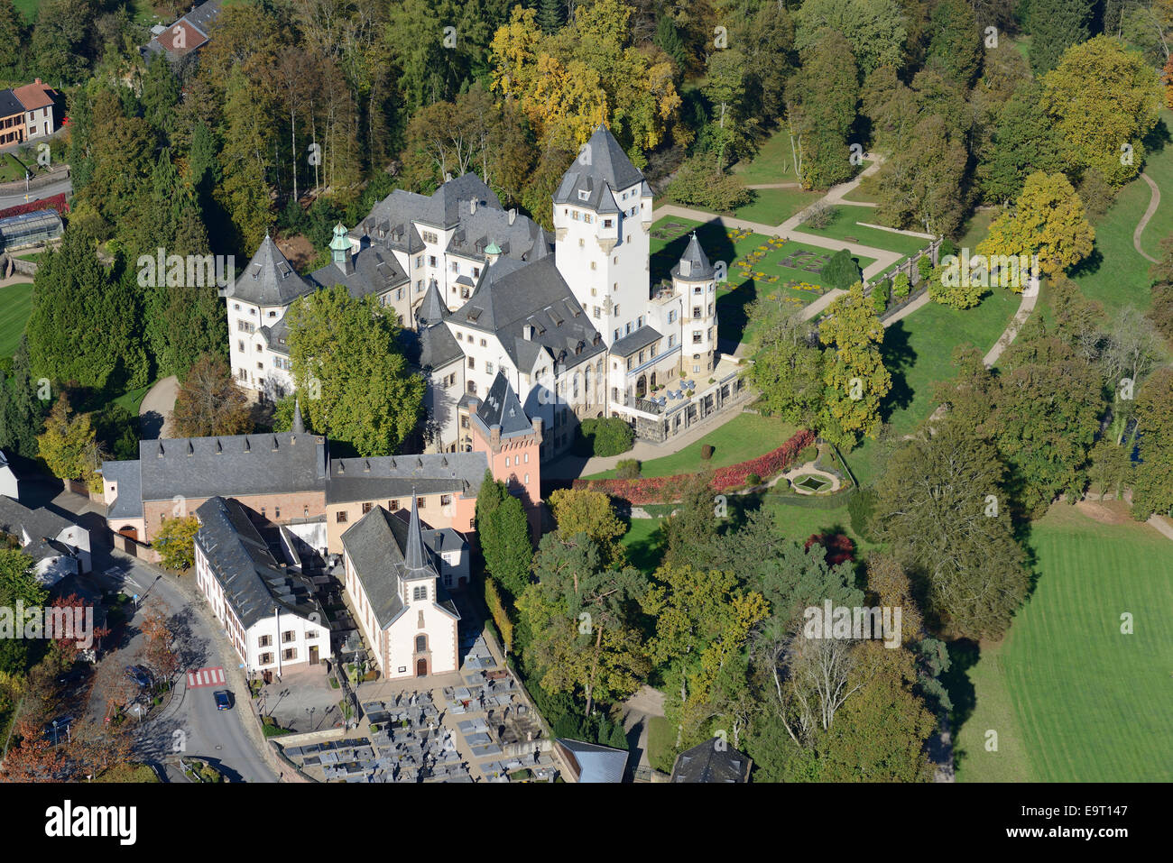 AERIAL VIEW. Berg Castle in the fall. Colmar-Berg, Luxembourg District, Luxembourg. Stock Photo