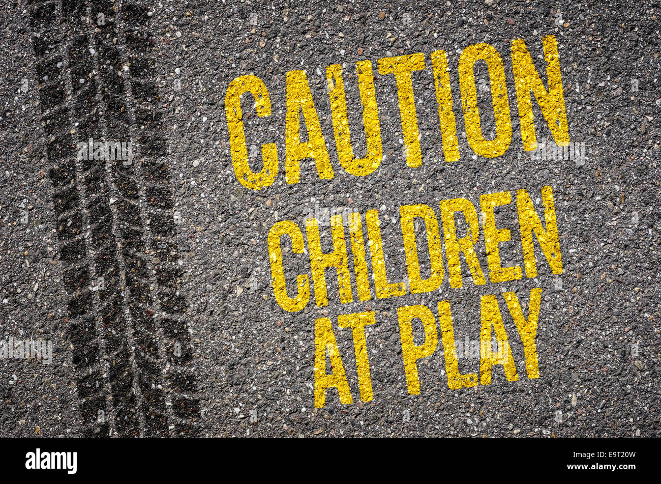Lane with the text Caution Children at play Stock Photo