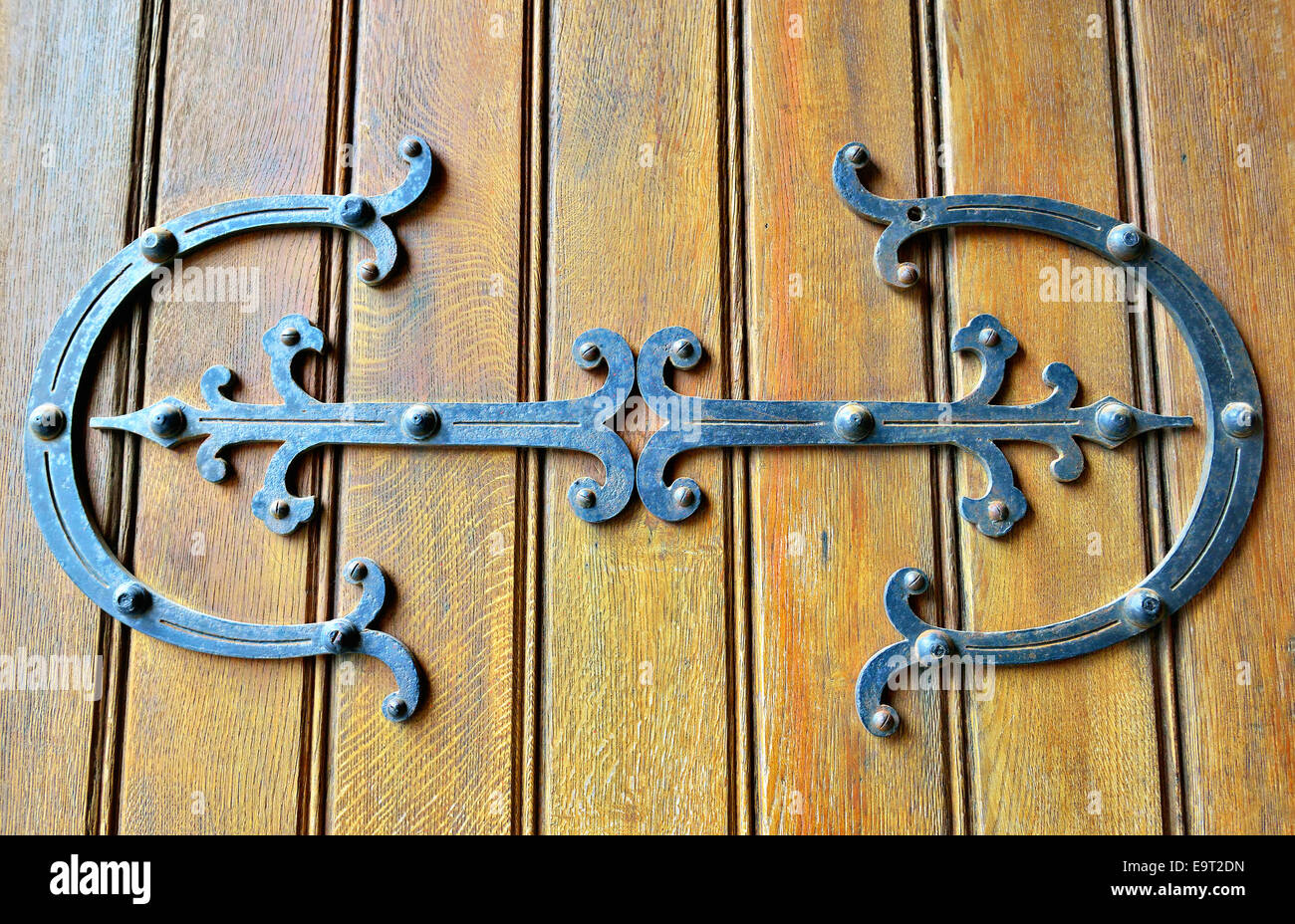 Gothic style wooden door of church in Belgium. Stock Photo