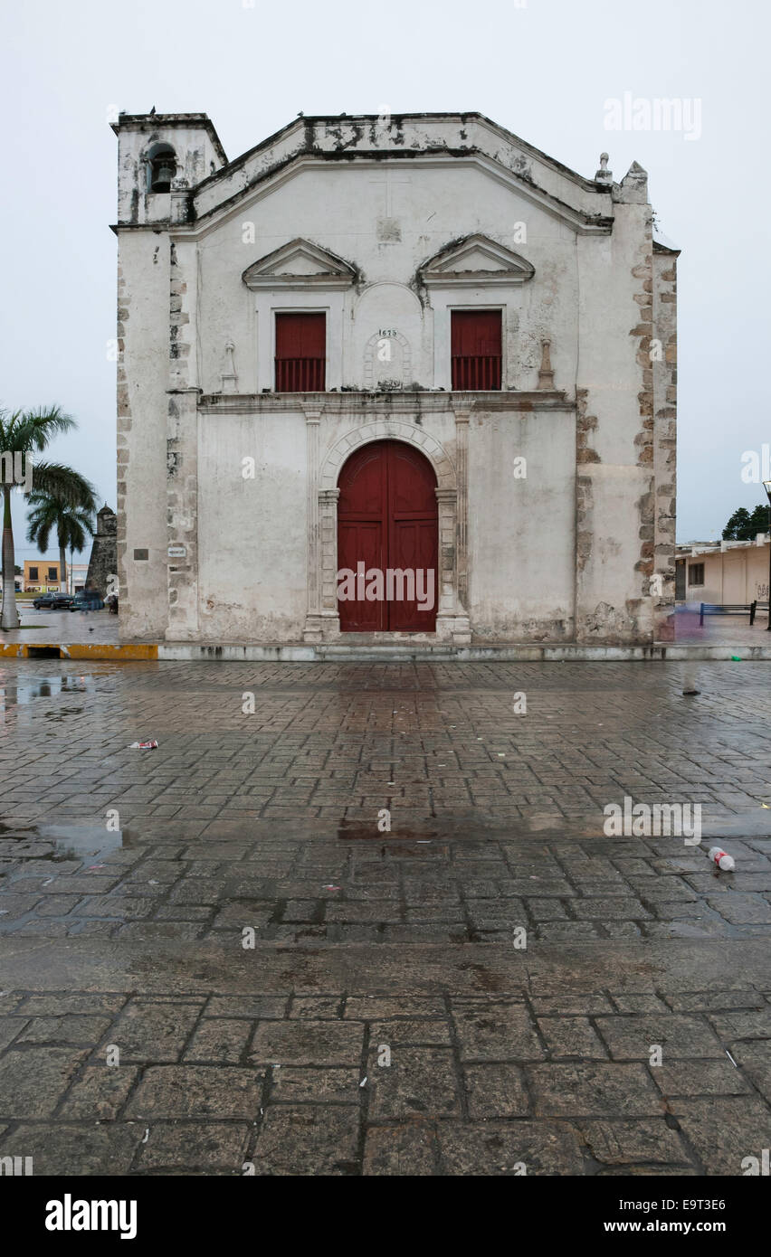 Front of Iglesia de San Juan Church on a rainy winter day in Campeche, Mexico Stock Photo