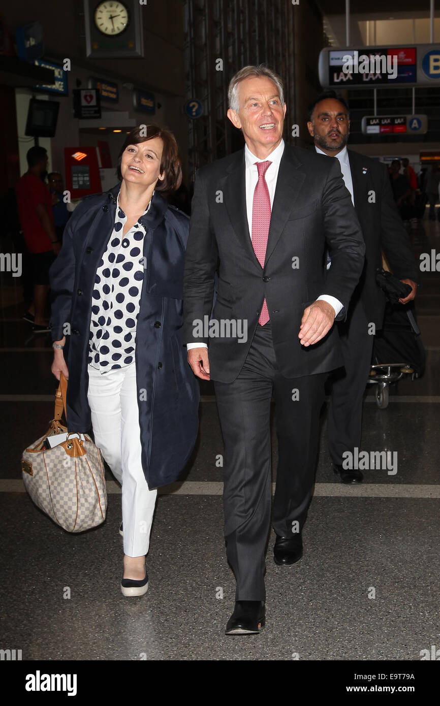 Former Prime Minister Tony Blair and his wife Cherie Blair at Los Angeles International Airport (LAX)  Featuring: Tony Blair,Cherie Blair Where: Los Angeles, California, United States When: 29 Apr 2014 Stock Photo