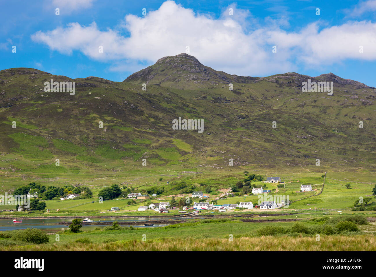 Traditional Scottish village nestled by the shoreline at Kilchoan on the Ardnamurchan Peninsula in Western Highlands of SCOTLAND Stock Photo
