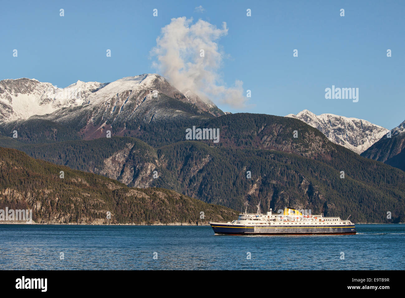 Southeast Alaskan ferry in the Lynn Canal near Haines on a sunny fall day. Stock Photo