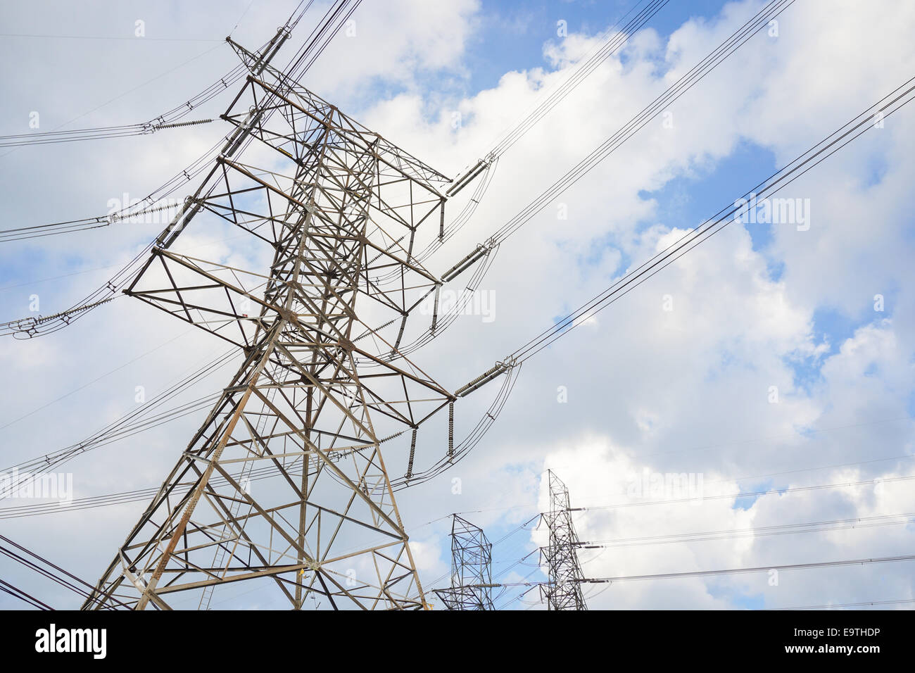Hight voltage tower line on the cloudy sky background Stock Photo - Alamy