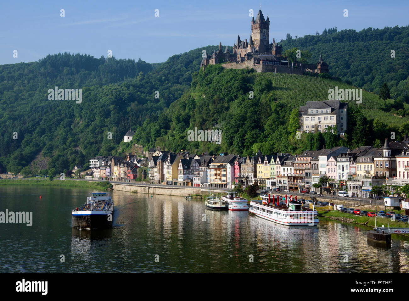 Colourful riverside buildings and Reichsburg Castle Cochem Moselle Valley Germany Stock Photo