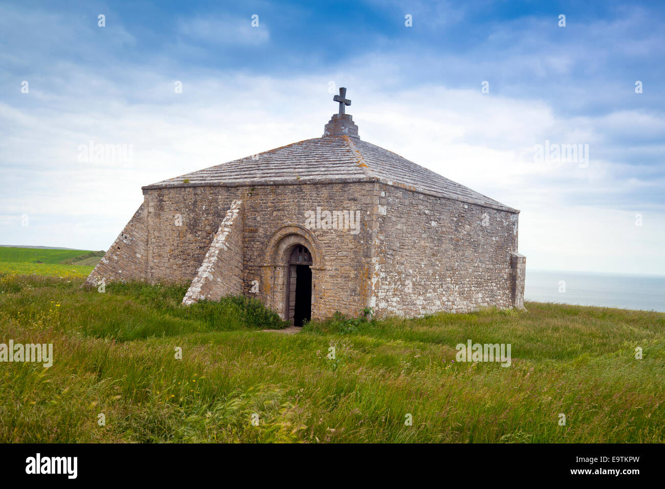 St Aldhelm's Chapel, a Scheduled Ancient Monument, on the South West Coast Path at St Aldhelm's Head in Dorset England UK Stock Photo