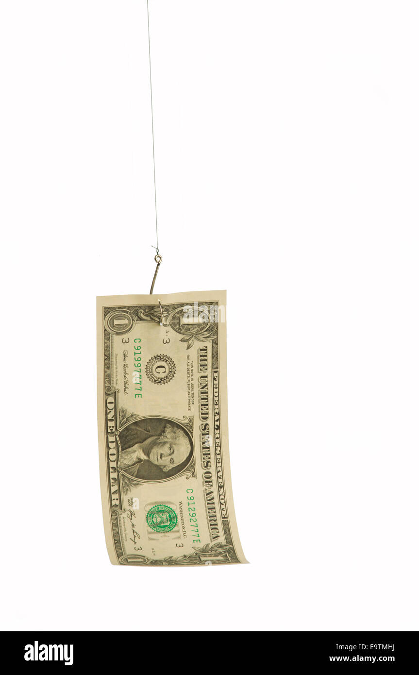 American dollar on a fish hook Stock Photo Alamy
