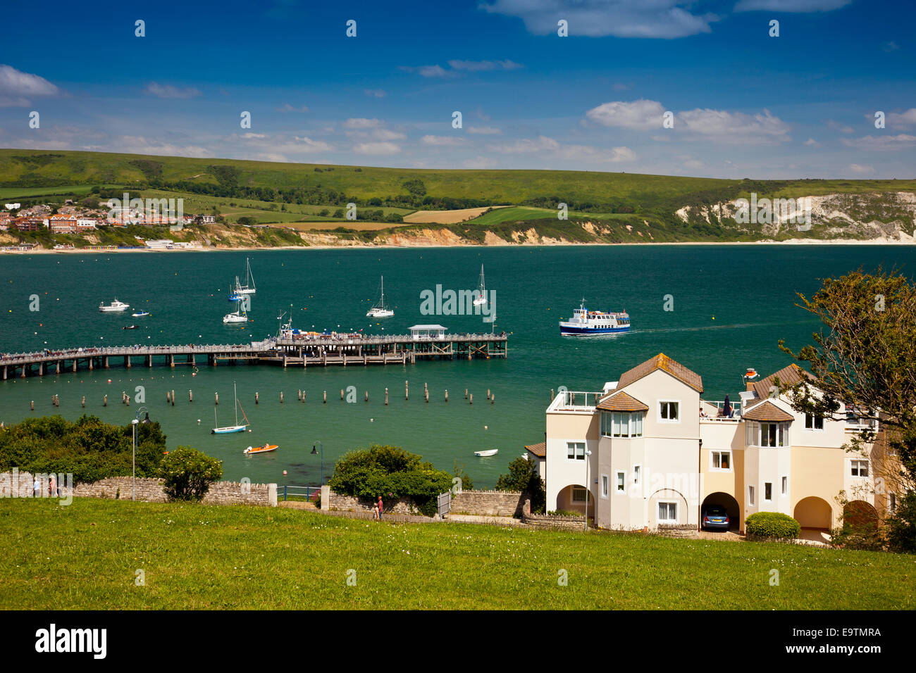 The 'Solent Scene' ferry from Poole arrives at the restored Victorian Pier in Swanage on the Jurassic Coast Dorset England UK Stock Photo