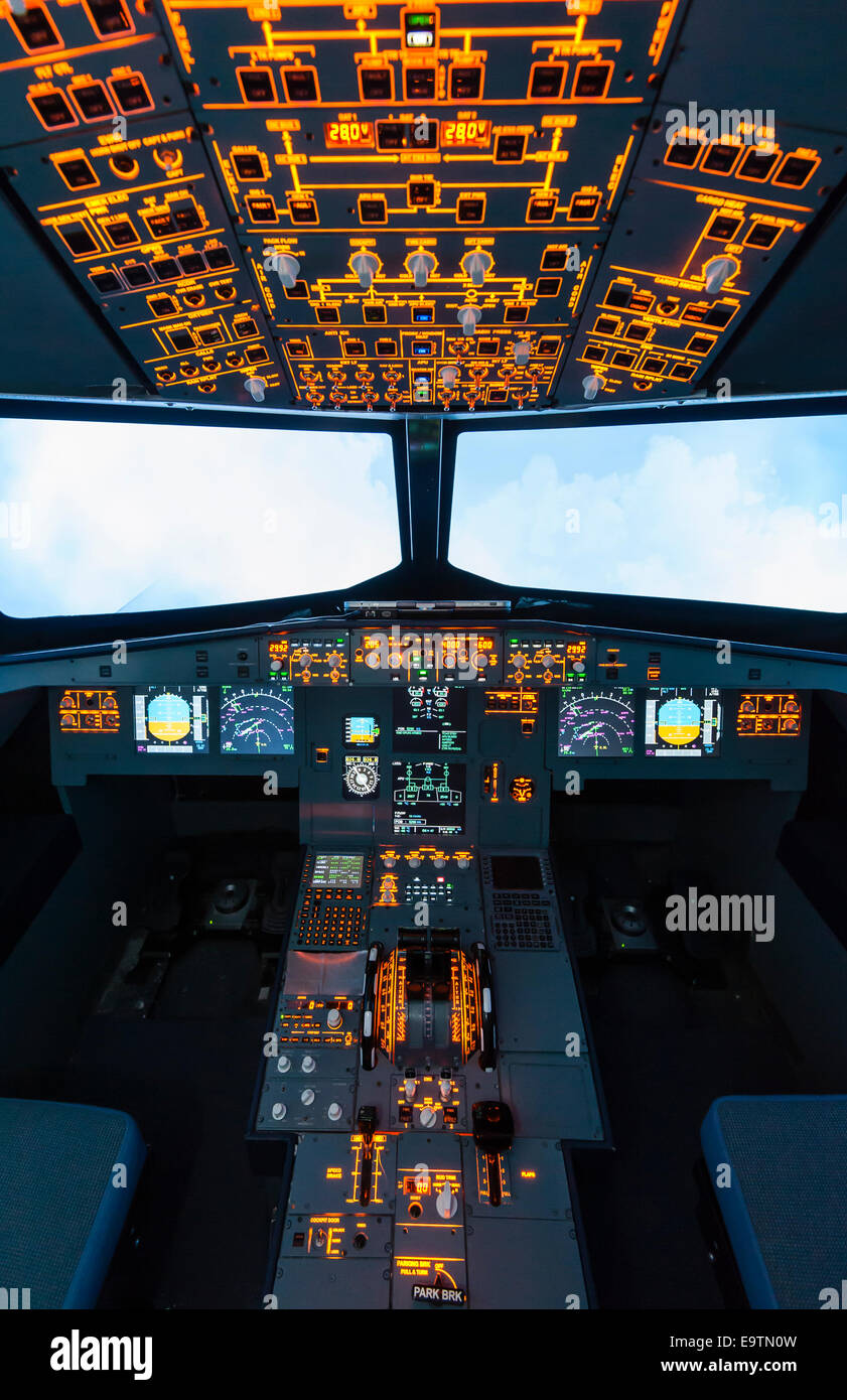Cockpit of an Airbus A320 flight simulator that is used for training of professional airline pilots. Stock Photo