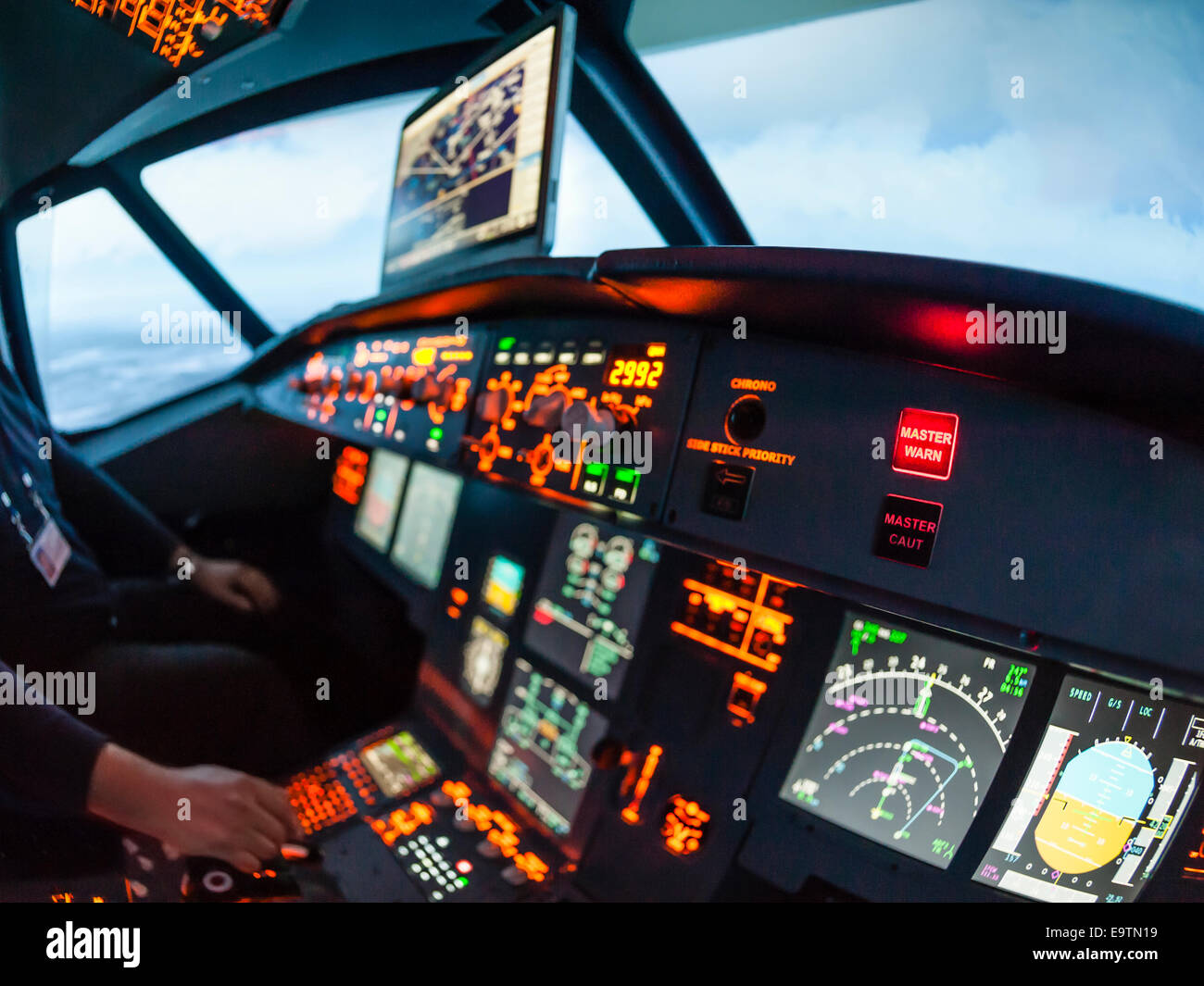 Cockpit of an Airbus A320 flight simulator that is used for training of  professional airline pilots (flashing warning light Stock Photo - Alamy