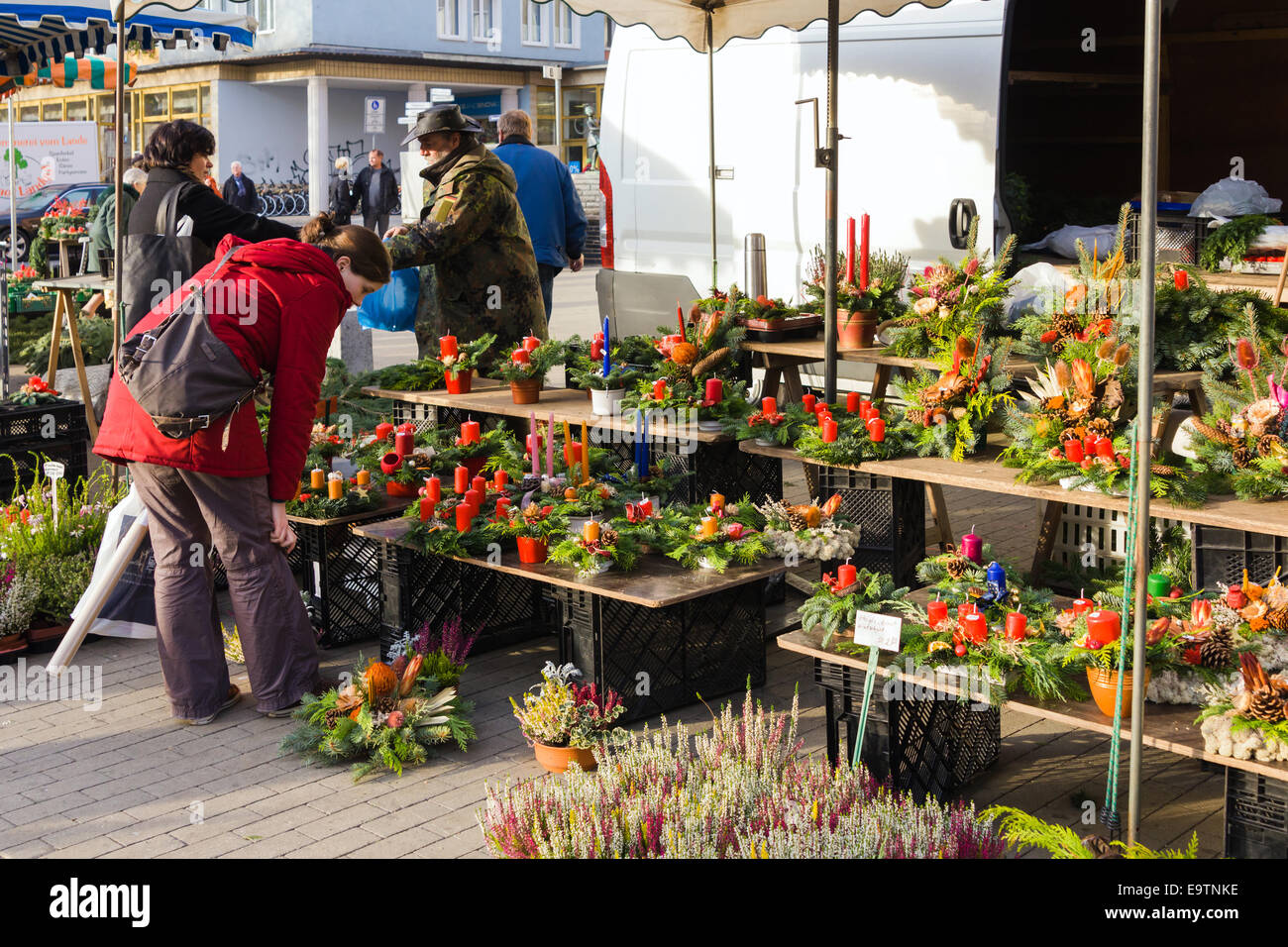 People shopping for Christmas decorations and pine trees, outdoor