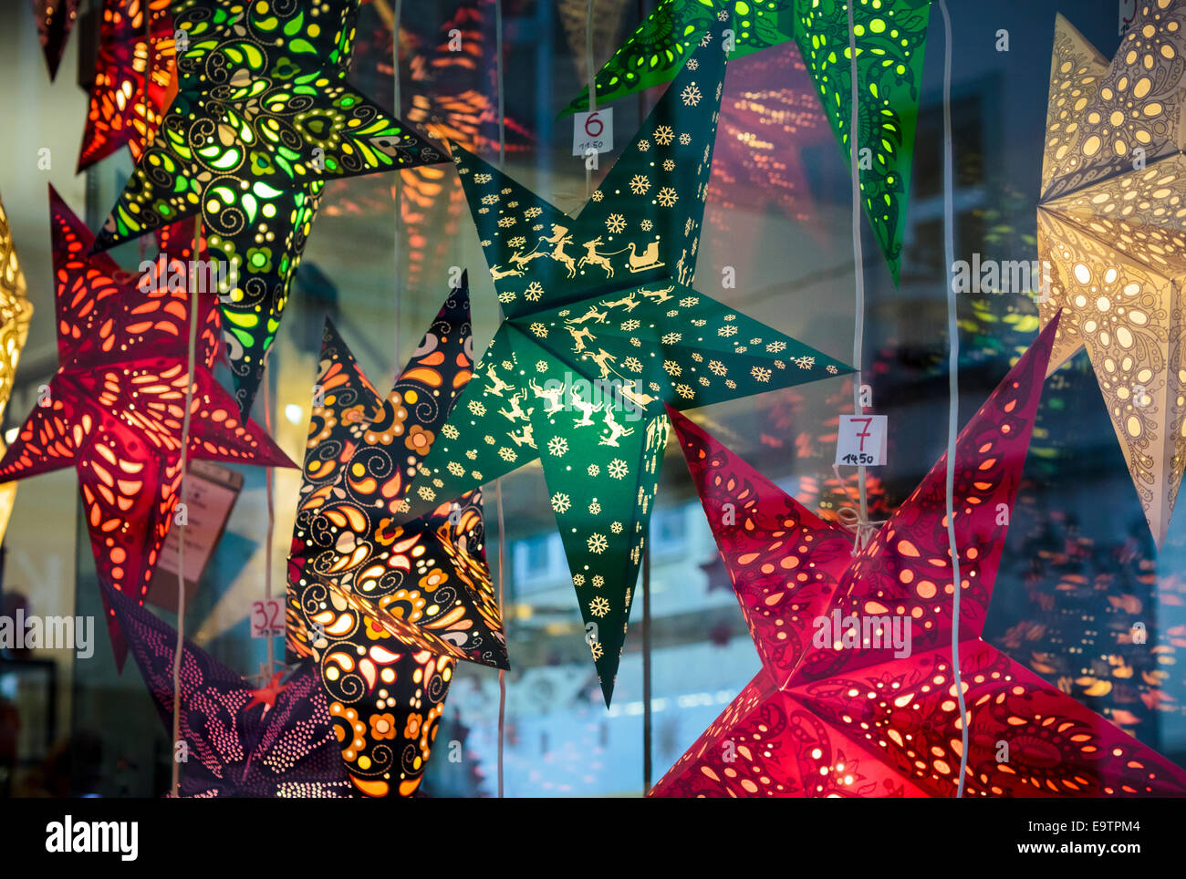 Festive star-shaped paper lanterns for sale at a German Christmas market  Stock Photo - Alamy
