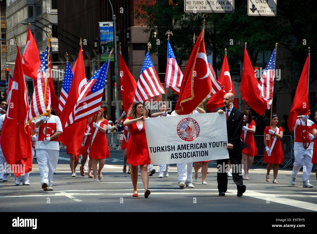 NYC Marchers carrying flags at the annual Turkish Day Parade on