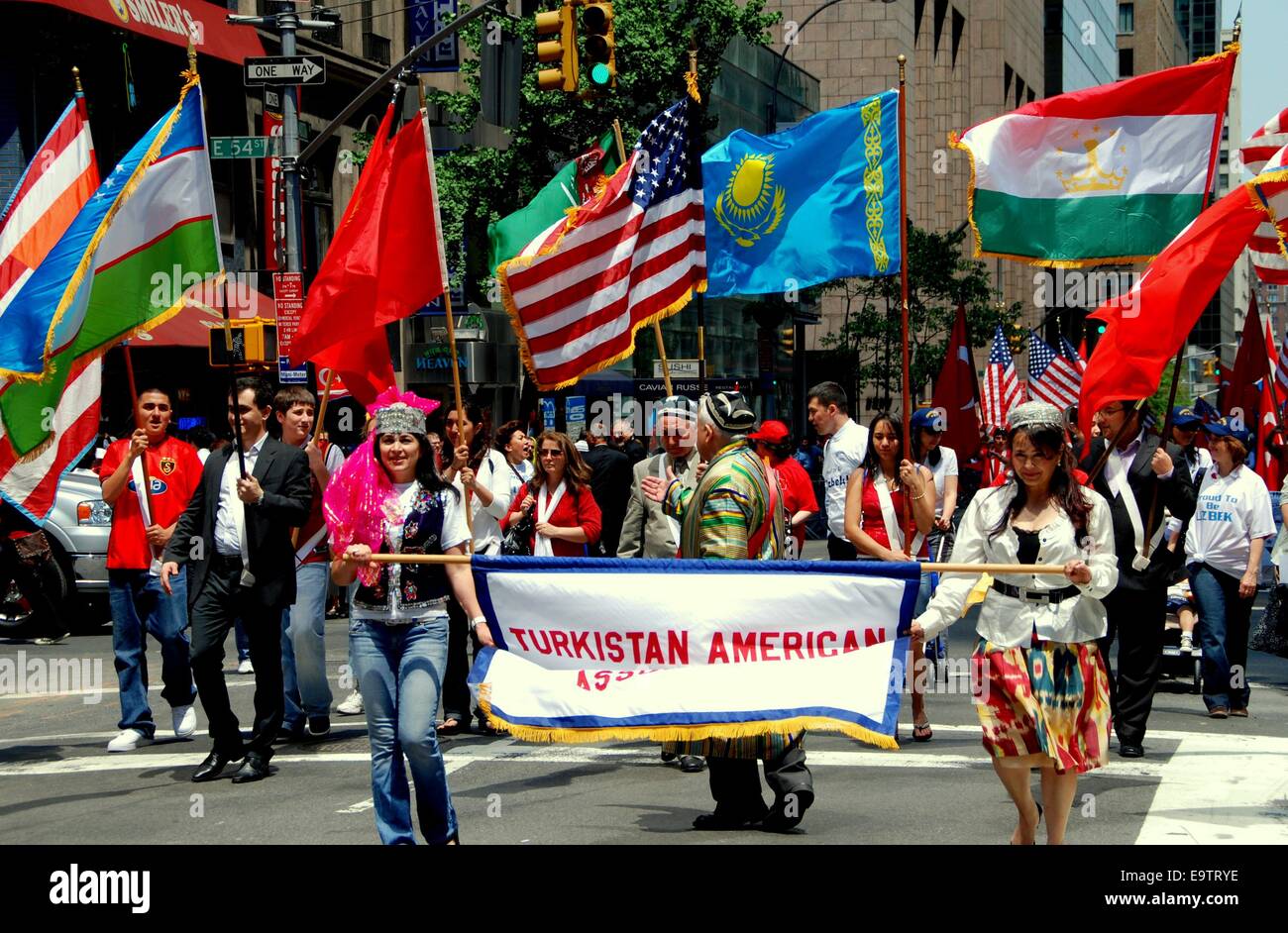 NYC:  Marchers carrying Turkistan banner and colourful flags at the annual Turkish Day Parade on Madison Avenue Stock Photo