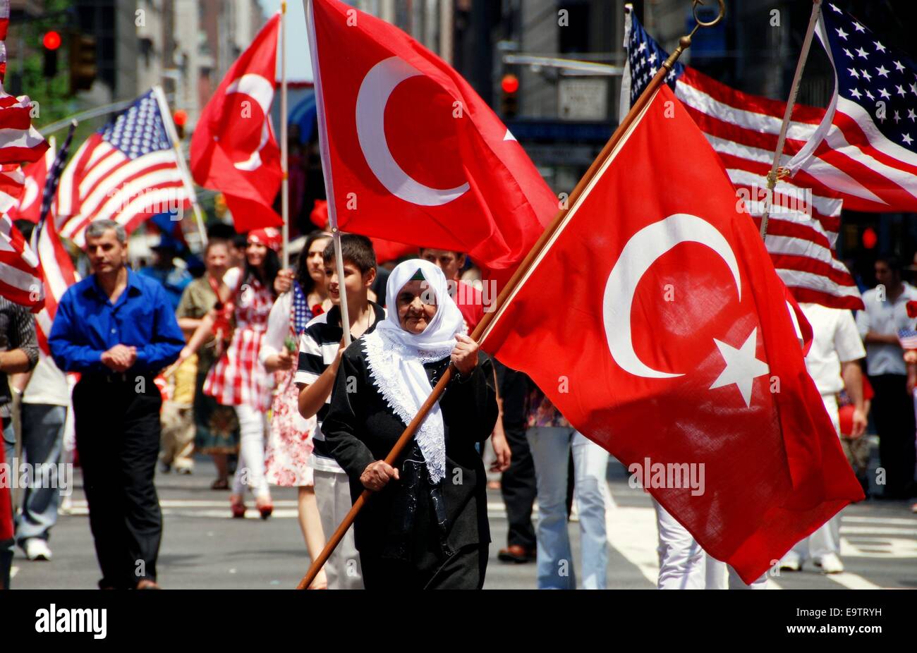 NYC Woman holding flag of Turkey at the annual Turkish Day Parade on