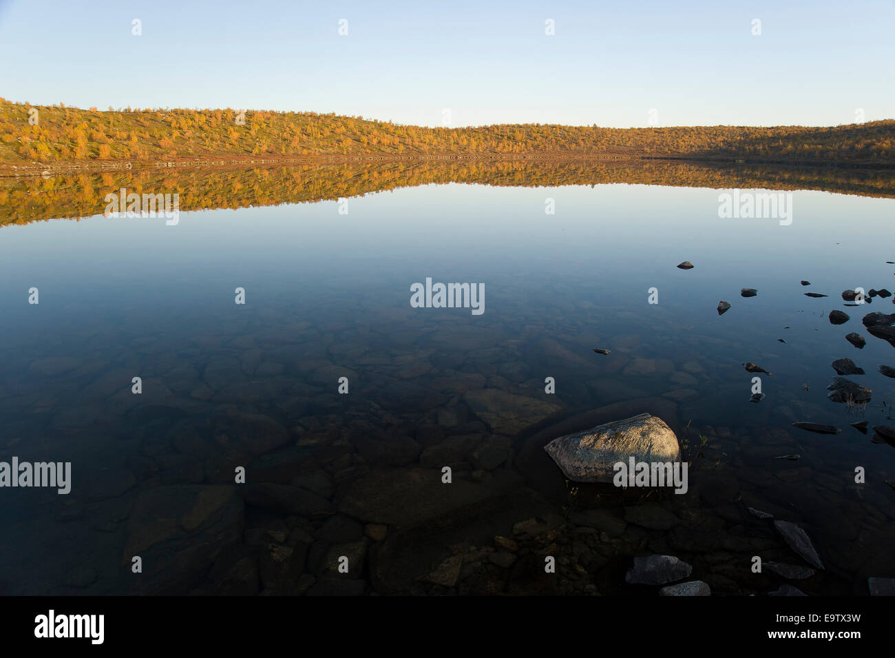Blue fell lake at sunset Stock Photo