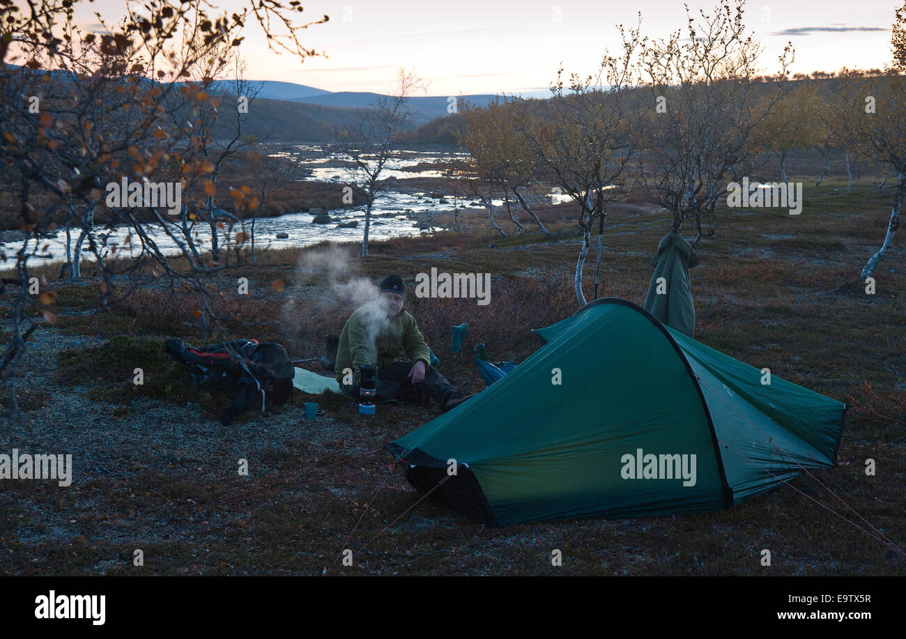A hiker's campsite at evening Stock Photo