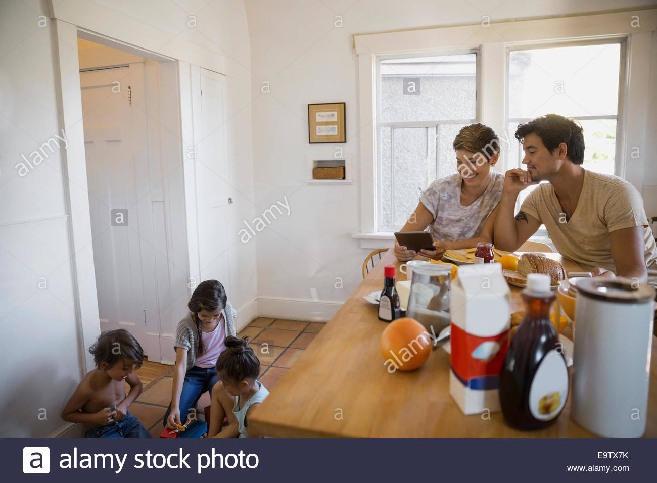 Family in kitchen Stock Photo Alamy