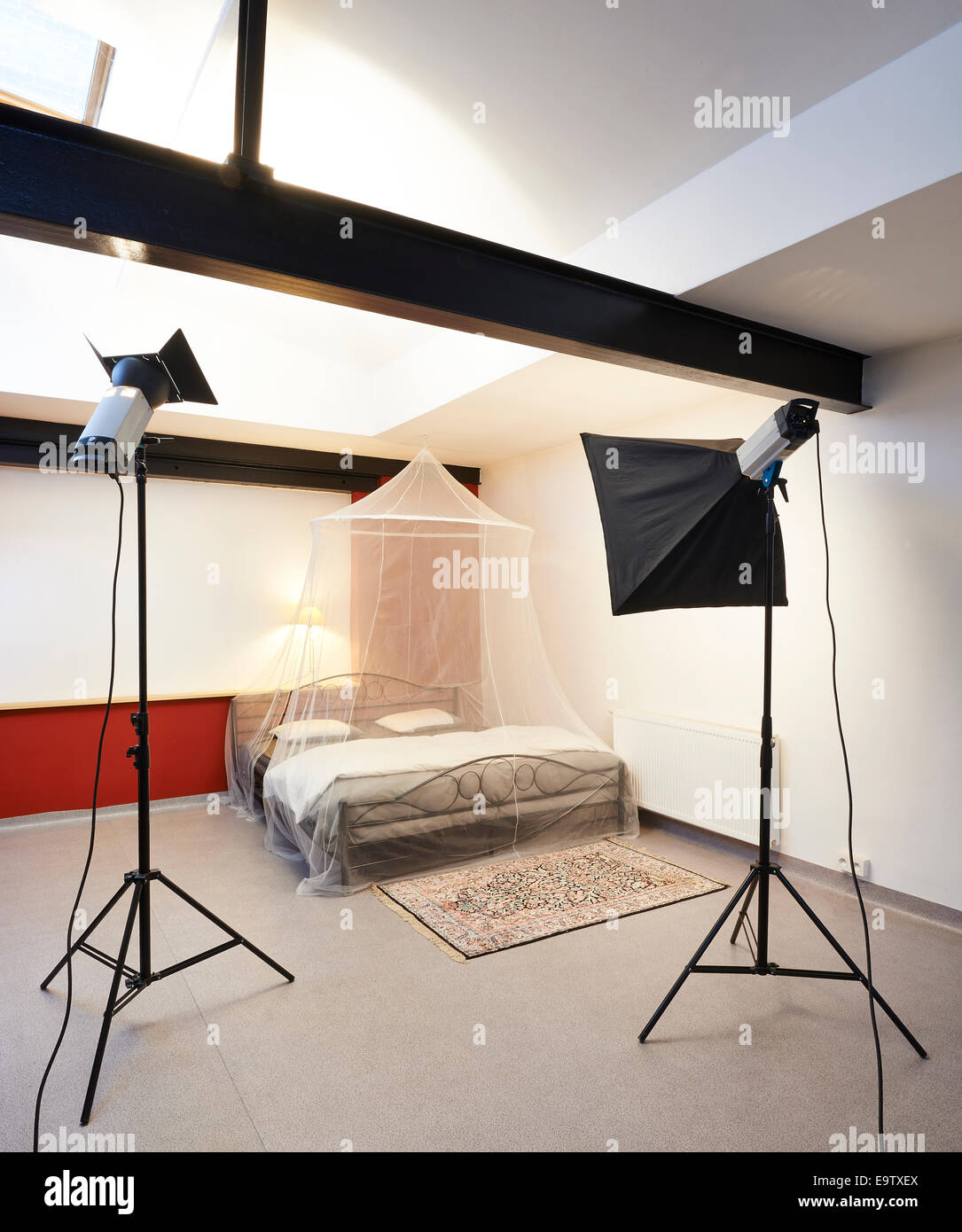 Photo studio with lighting equipment , ready to shoot bed Stock Photo