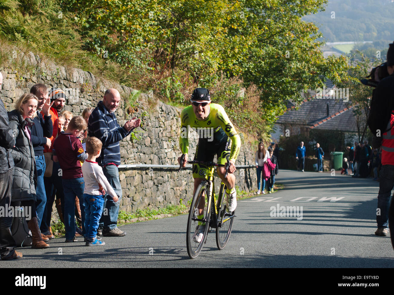 Cyclist in hill climbing race in Ramsbottom, Lancashire Stock Photo - Alamy