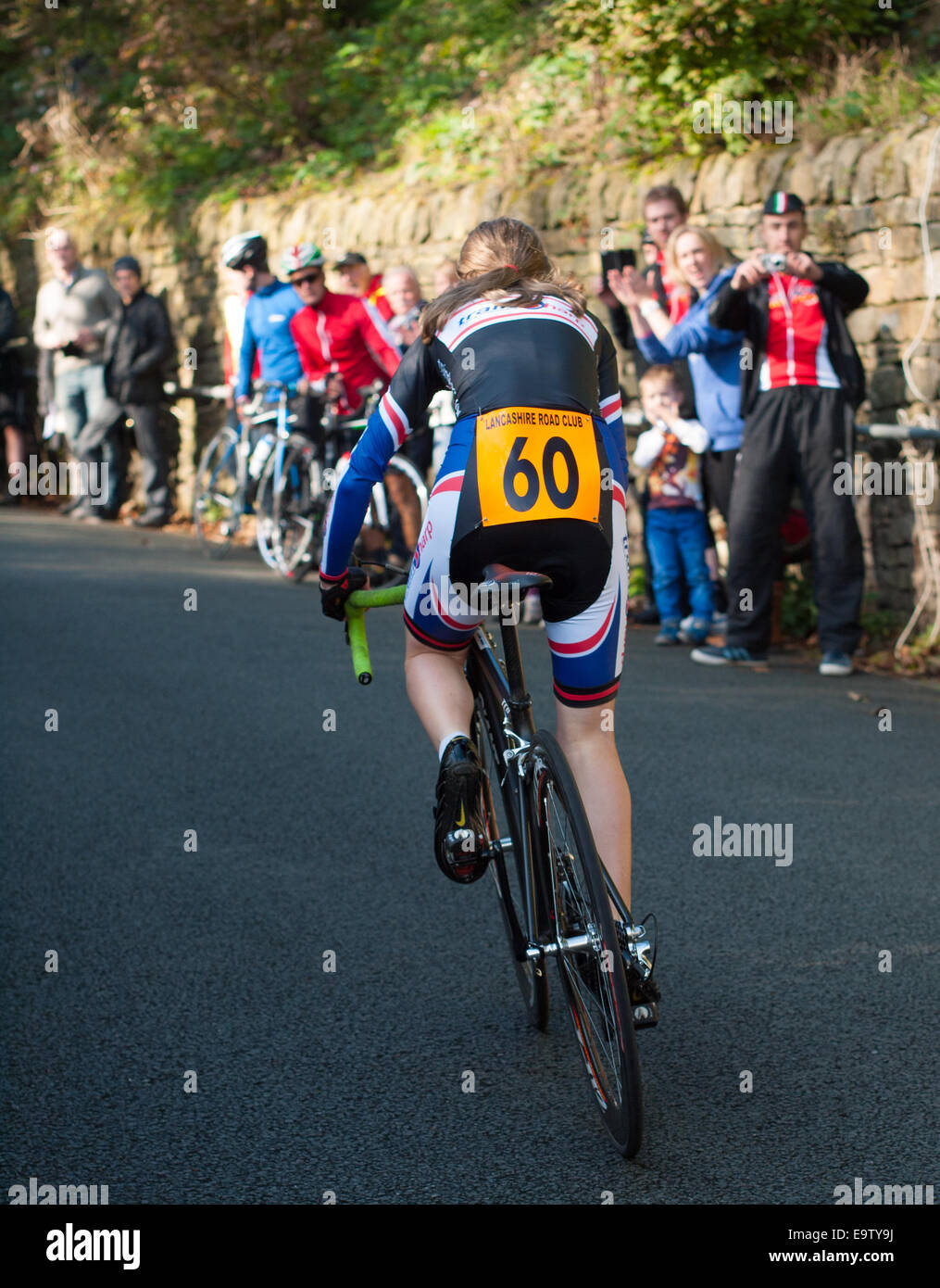 Cyclist in hill climbing race in Ramsbottom, Lancashire Stock Photo - Alamy