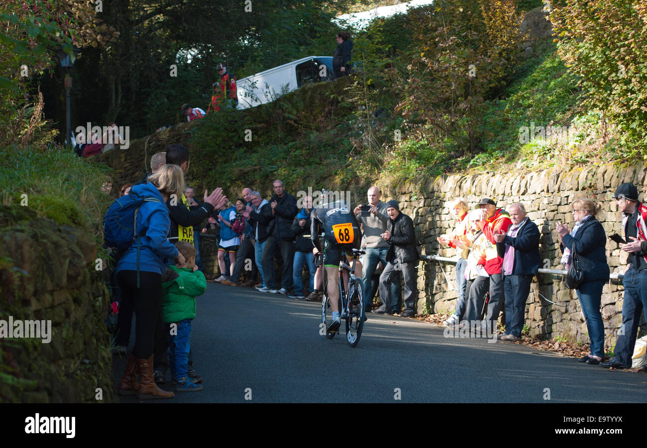 Cyclist in hill climbing race in Ramsbottom, Lancashire Stock Photo - Alamy