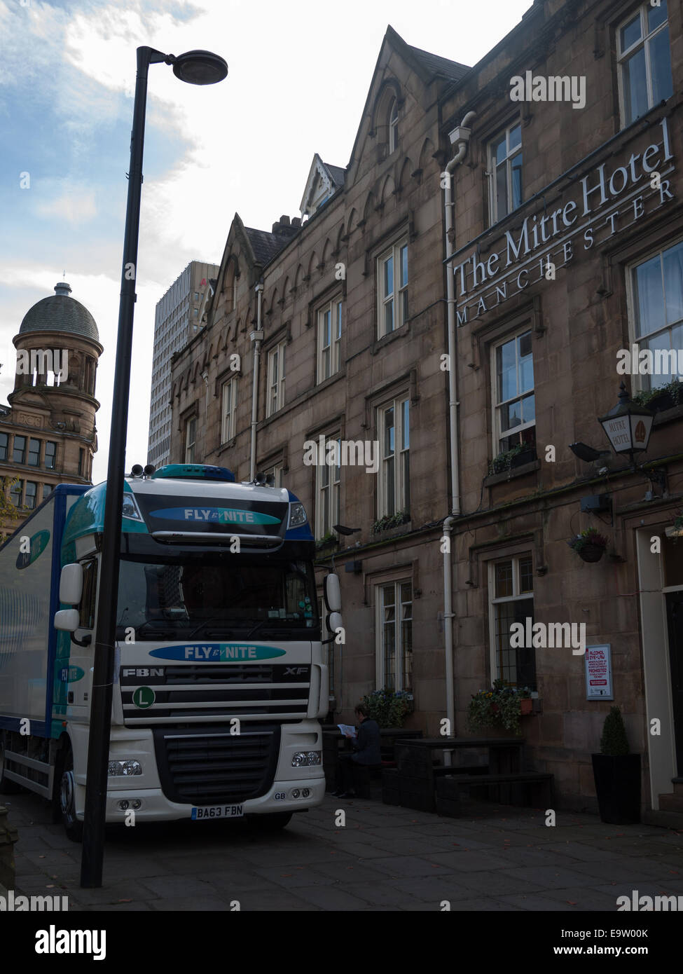 Large truck parked outside The Mitre Hotel, Manchester Stock Photo