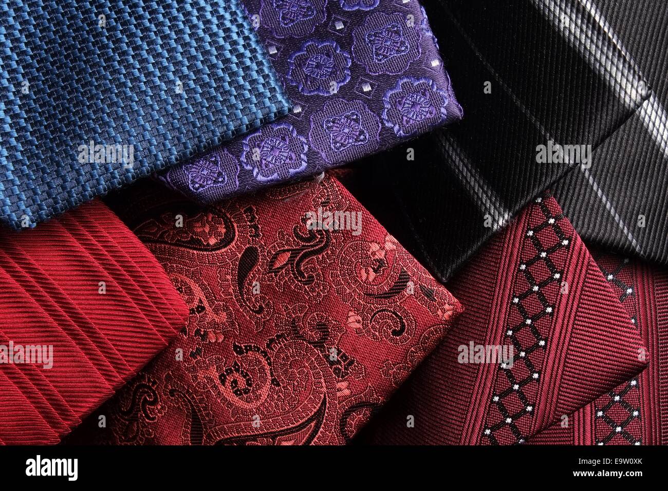 Rolled up silk ties on top of each other Stock Photo Alamy