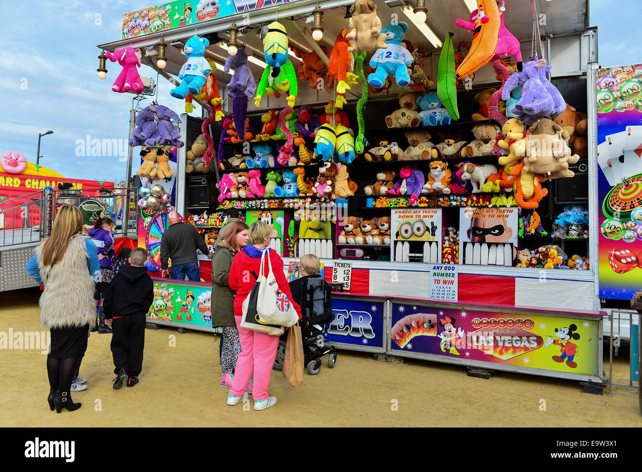 Stock photo Fair ground amusements stall and prizes. Sweeney
