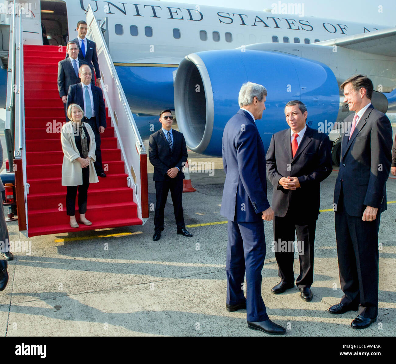 U.S. Secretary of State John Kerry chats with Indonesian Ministry of Foreign Affairs Ambassador Dian Triansyah Djani and U.S. Ambassador to Indonesia Robert Blake as he and the rest of a delegation representing President Obama arrive in Jakarta, Indonesia Stock Photo