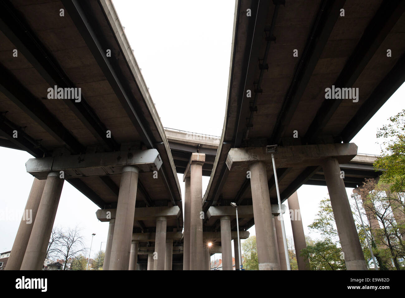 The view under the M6 motorway near Birmingham termed 'Spaghetti Junction' which sees the roadway lifted over the canal Stock Photo