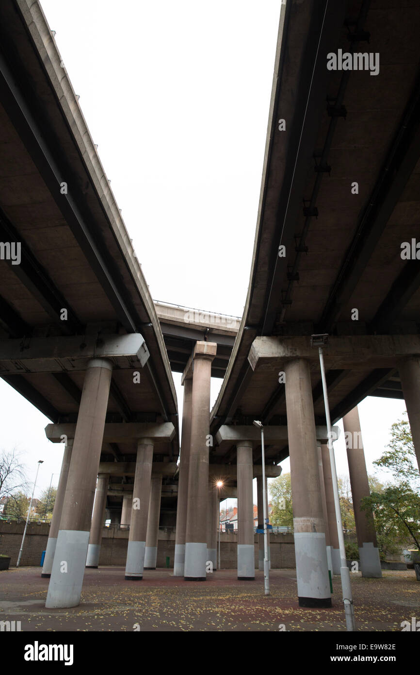 The view under the M6 motorway near Birmingham termed 'Spaghetti Junction' which sees the roadway lifted over the canal Stock Photo