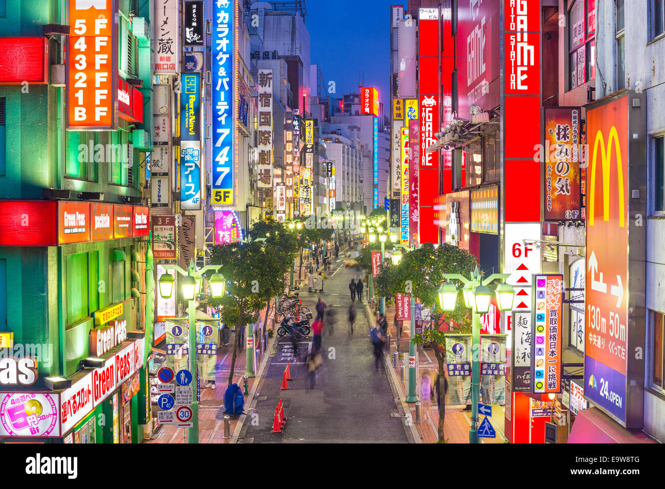 TOKYO, JAPAN - DECEMBER 17, 2012: Nightlife in theShinjuku District. The area is a famed nightlife and red-light district. Stock Photo