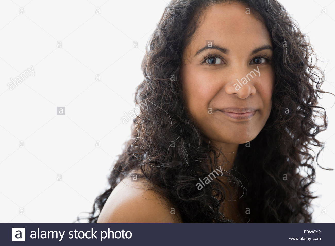 Curly hair woman studio hi-res stock photography and images - Alamy