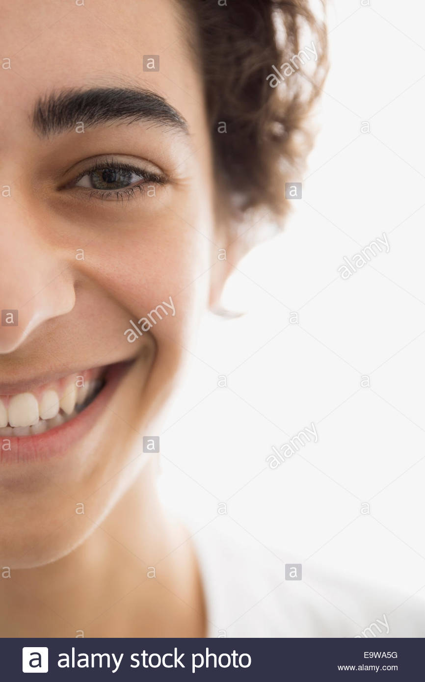 Close up portrait of enthusiastic young brunette man Stock Photo