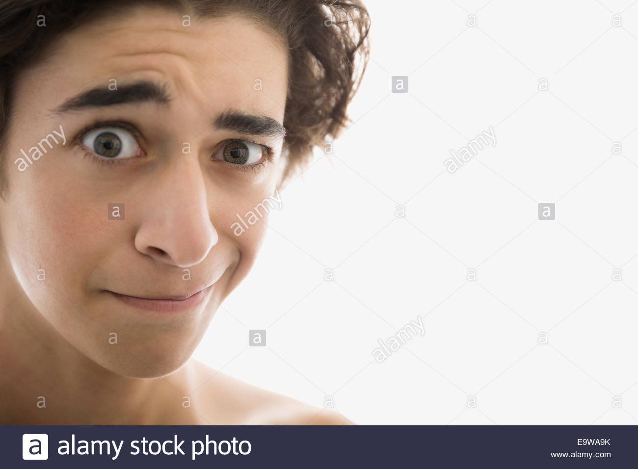 Close up of young man making a face Stock Photo