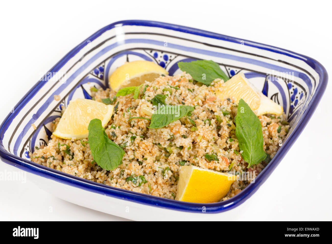 Turkish bulgur wheat salad, known as kisr, made with mint, cucumber