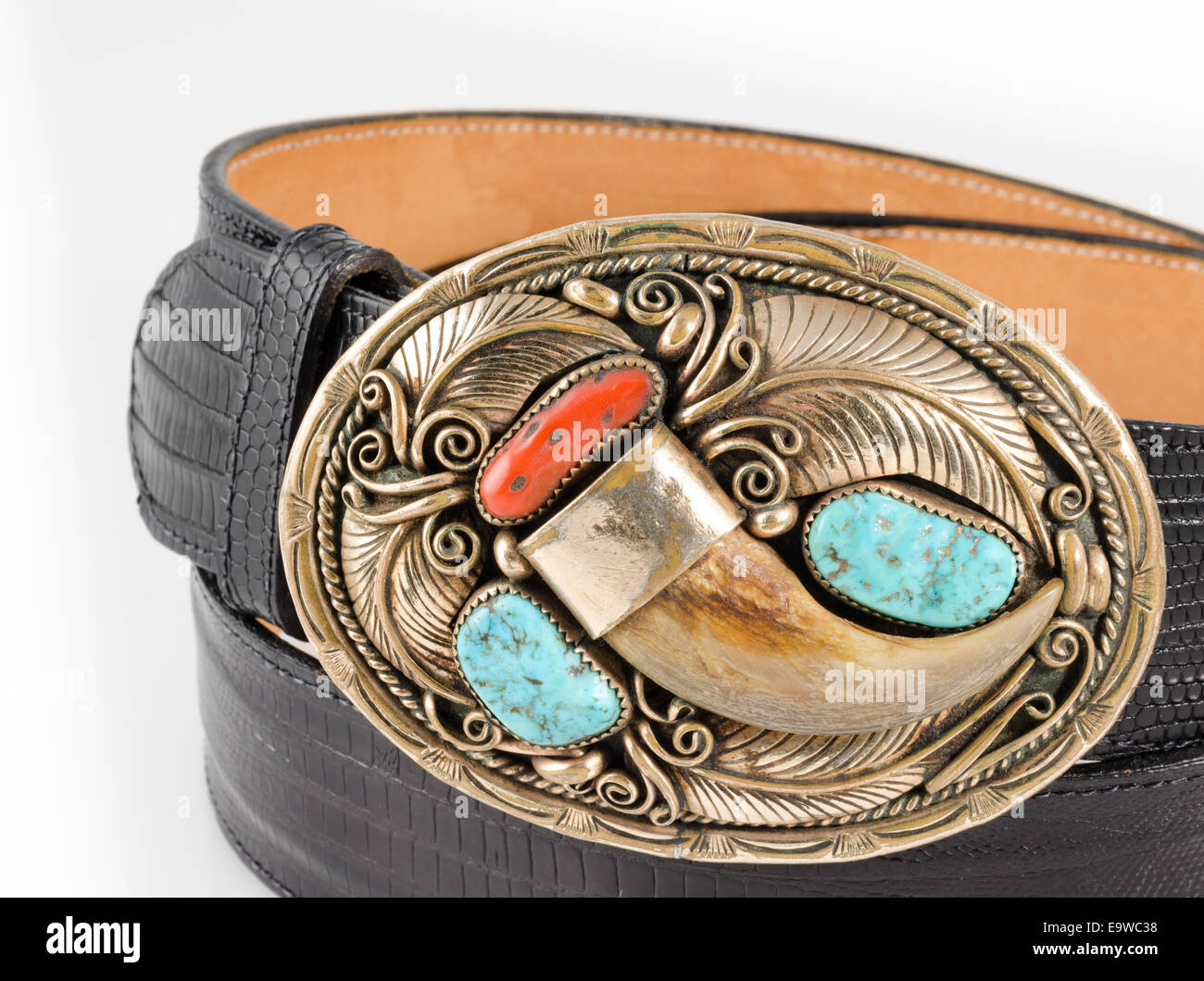 Gold, Bear Claw and Turquoise Belt Buckle and Snake Skin Belt. Stock Photo