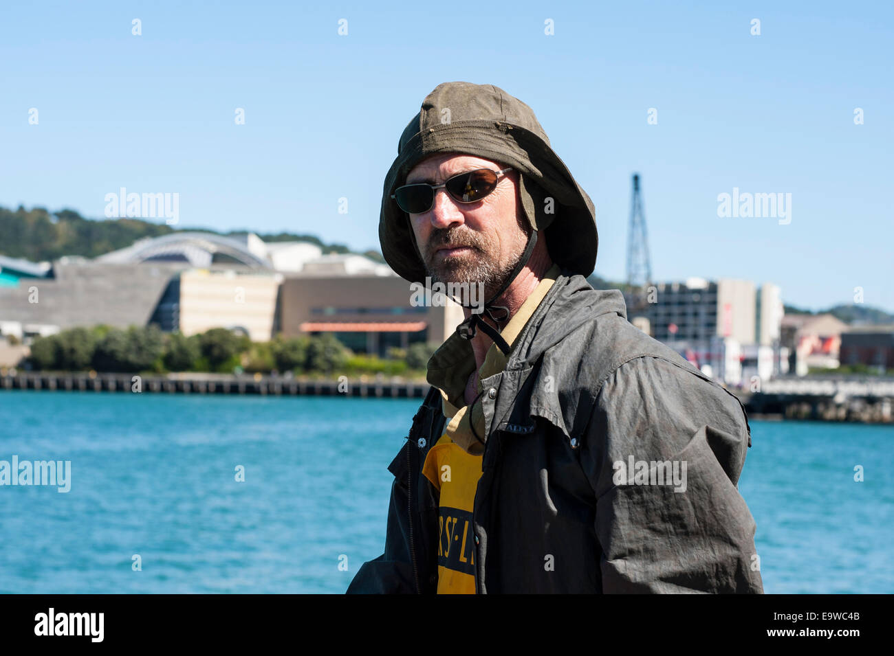 Man in oilskins and sou'wester, Auckland Stock Photo