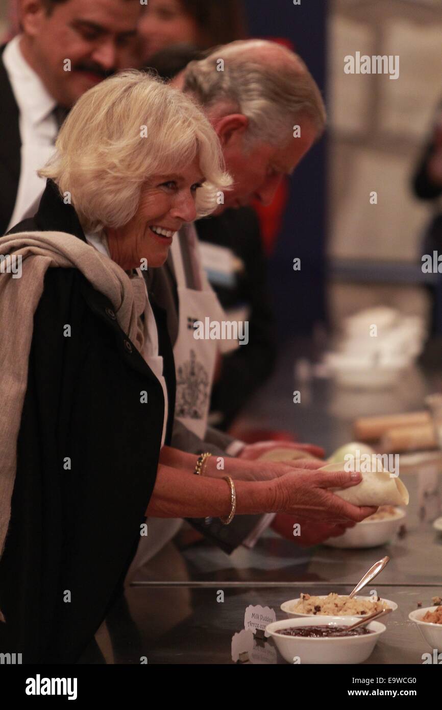Hidalgo, Mexico. 2nd Nov, 2014. British Prince Charles (R) and his wife Camilla (L), Duchess of Cornwall, make Pasties during a visit to the Pasty Museum, in the city of Pachuca, state of Hidalgo, Mexico, on Nov. 2, 2014. Credit:  Jose Mendez/POOL/Xinhua/Alamy Live News Stock Photo