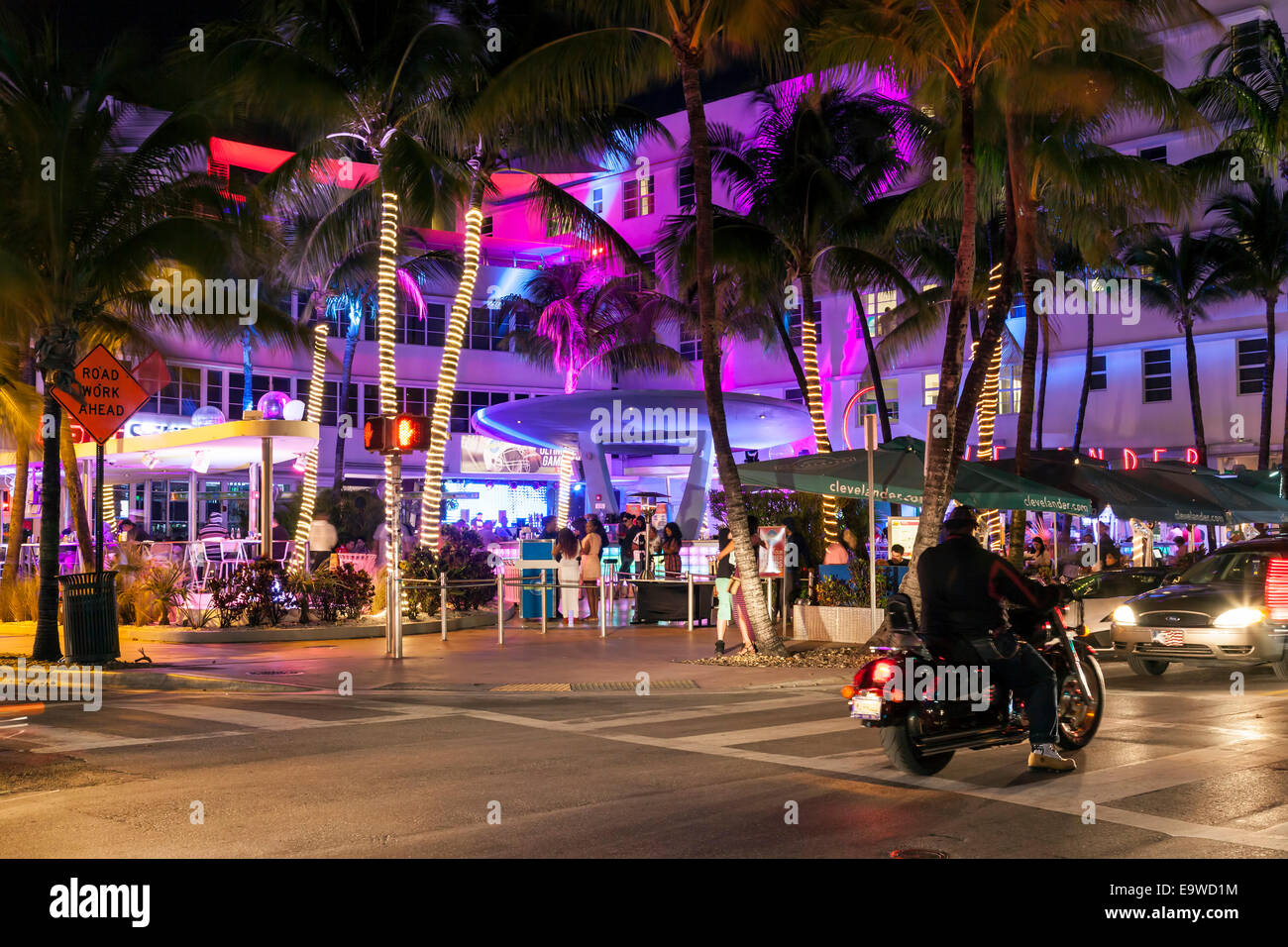 Colorful lighting of the Clevelander Hotel and Nightclub outdoor patio bar on Deco Drive in South Beach Miami, Florida, USA. Stock Photo