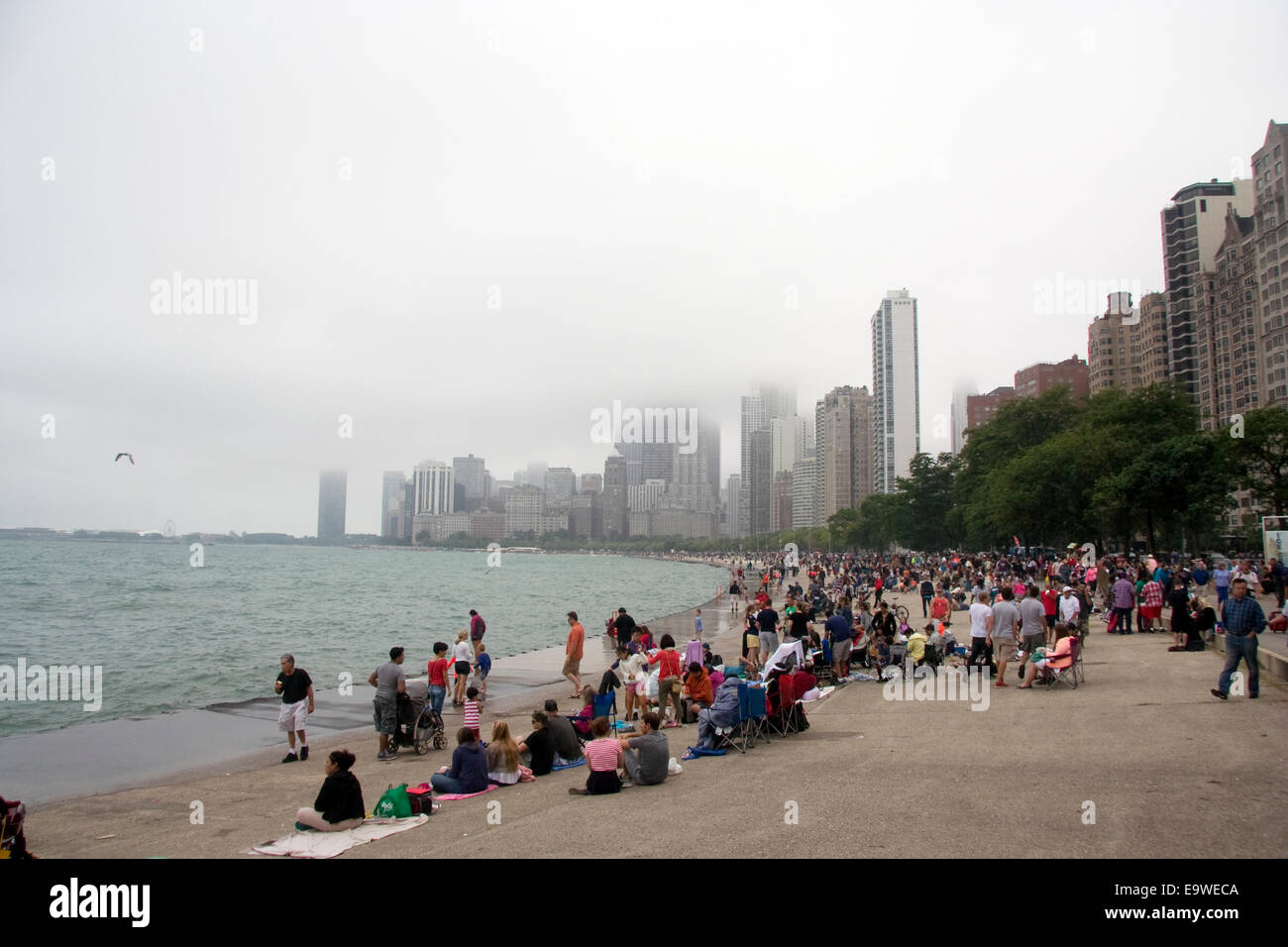 Spectators watching air and water show  at Chicago Lake shore Stock Photo