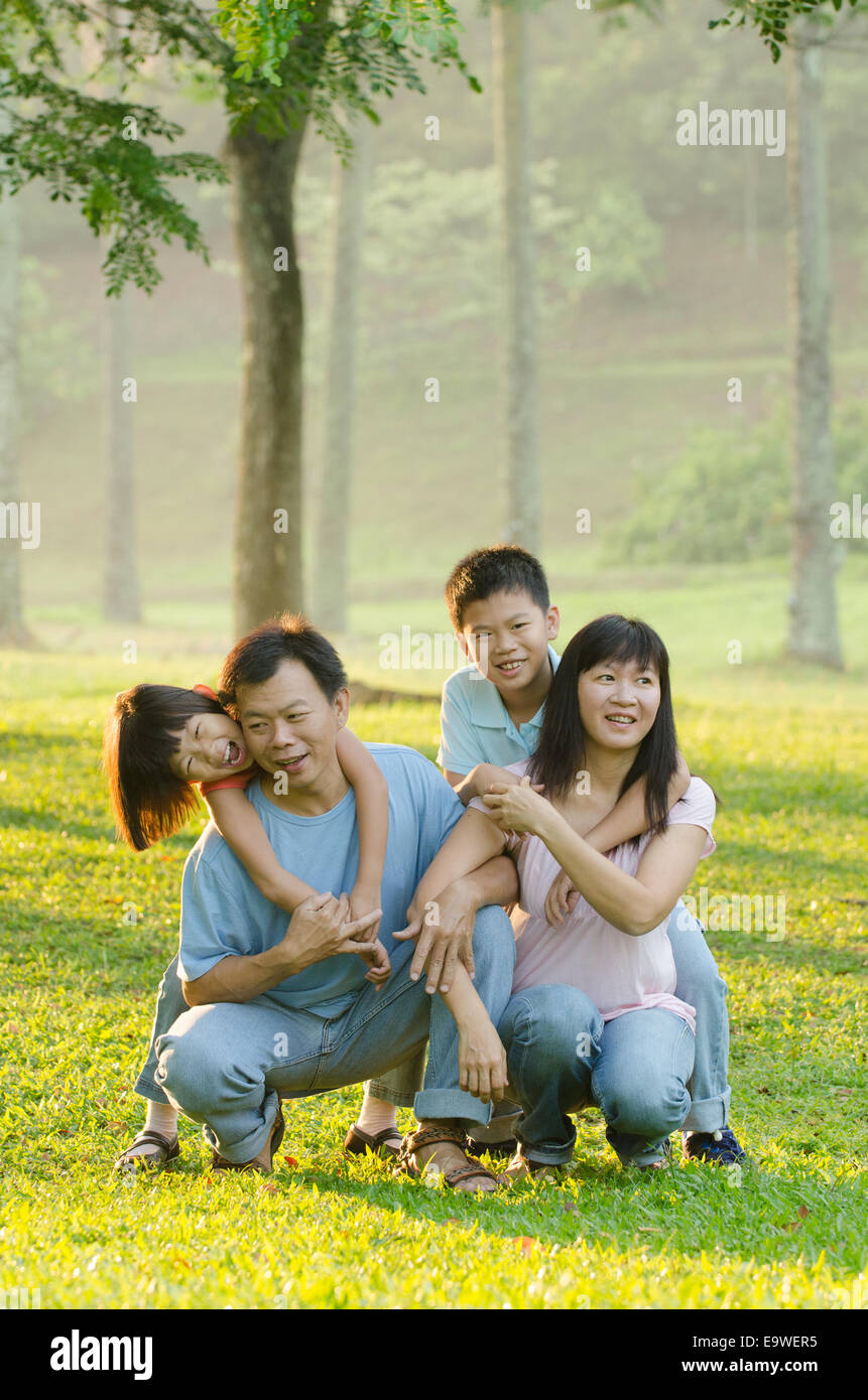 asian family enjoying outdoor at the park Stock Photo