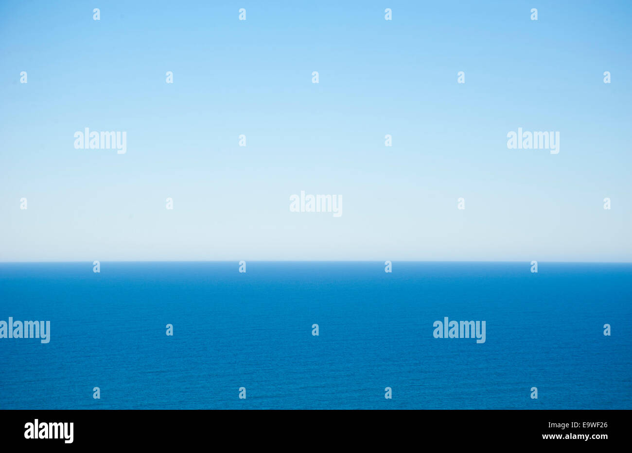 Ocean horizon with clear blue sky Stock Photo