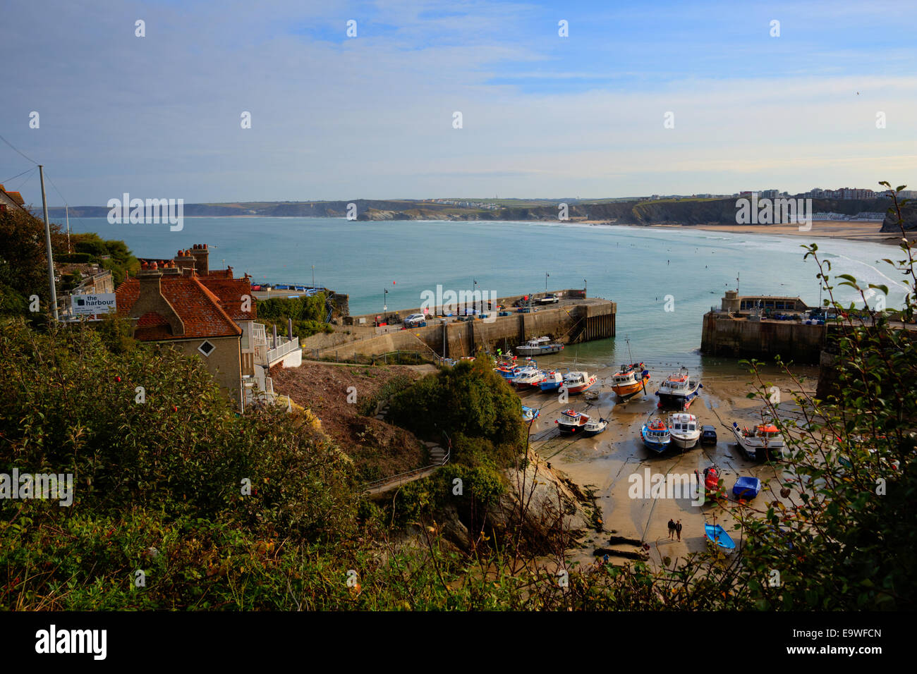 Newquay harbour North Cornwall England UK with boats and sandy beach Stock Photo